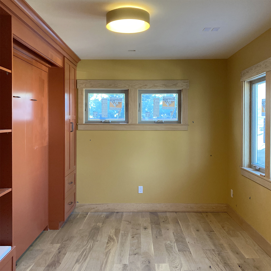 Brett Marlo Design Build Built Green 4-Star Tacoma remodel bedroom with murphy bed