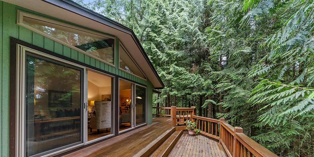 Deck looking out onto a forest