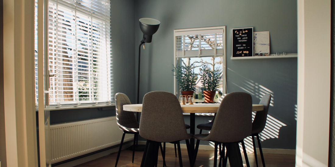 Dining room with multiple lighting sources